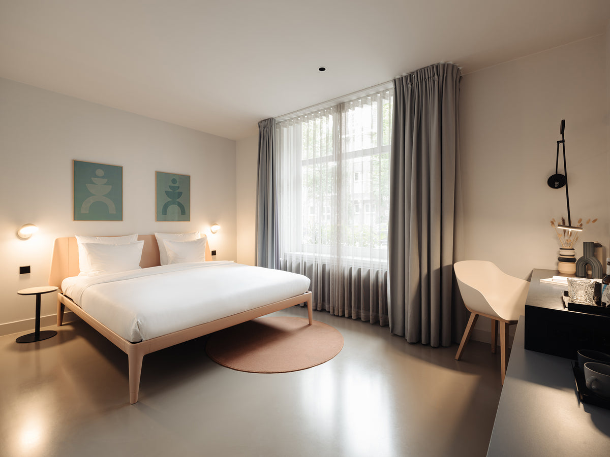 Bespoke colourful artwork by Marijn Vink created for Conscious Hotel Amsterdam, handmade contemporary art for a modern hotel interior.